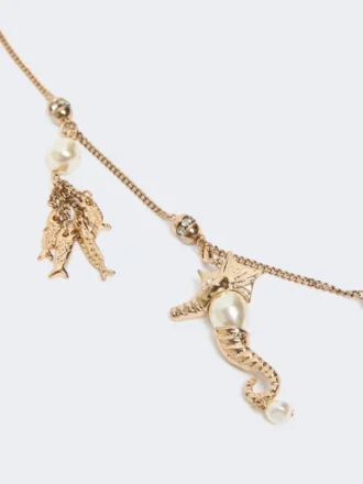 «abissi» metallisk halskjede med rhinestones, gull
