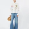 Bomullsbluse med blonder og broderier, hvit