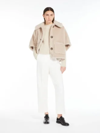Kappe i teddy-stoff av alpakka og ull, beige