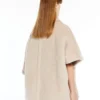 Kappe i teddy-stoff av alpakka og ull, beige