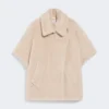 Kappe i teddy-stoff av alpakka og ull, beige
