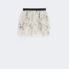 Kort skjørt med blomsterblader i trykt organza, perlegrå Kort skjørt med blomsterblader i trykt organza, perlegrå