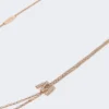 Langt halskjede med monogramdetaljer, elfenben