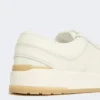 Lavskosneakers i tumlet skinn, hvite