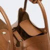 Liten marineveske i skinn, brunbronse Liten marineveske i skinn, brunbronse