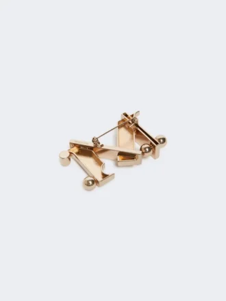 Monogram-brosje i metall, gull