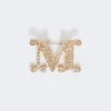 Monogrambrosje med krystaller, optisk hvit Monogrambrosje med krystaller, optisk hvit