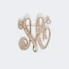 Monogrambrosje med rhinestones, elfenben Monogrambrosje med rhinestones, elfenben
