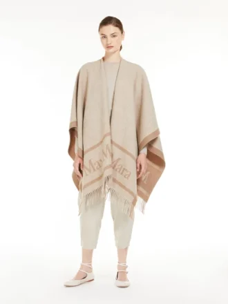 Poncho i jacquardull, beige