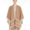 Poncho i jacquardull, kamel Poncho i jacquardull, kamel