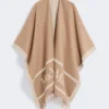 Poncho i jacquardull, kamel Poncho i jacquardull, kamel