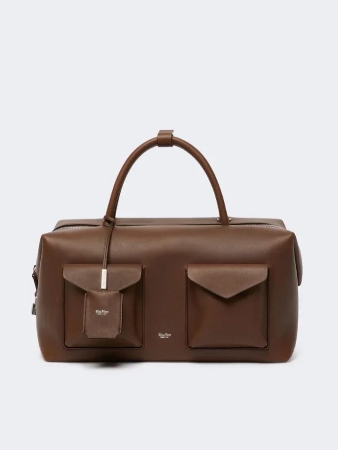 Stor bostonbag i skinn med lommer, brun
