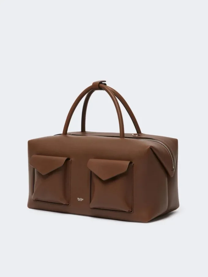 Stor bostonbag i skinn med lommer, brun