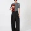 Stretchbukser i ull med vid passform, svart