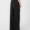 Stretchbukser i ull med vid passform, svart