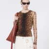 Top i to materialer med dyremønster, beige nyanser Top i to materialer med dyremønster, beige nyanser