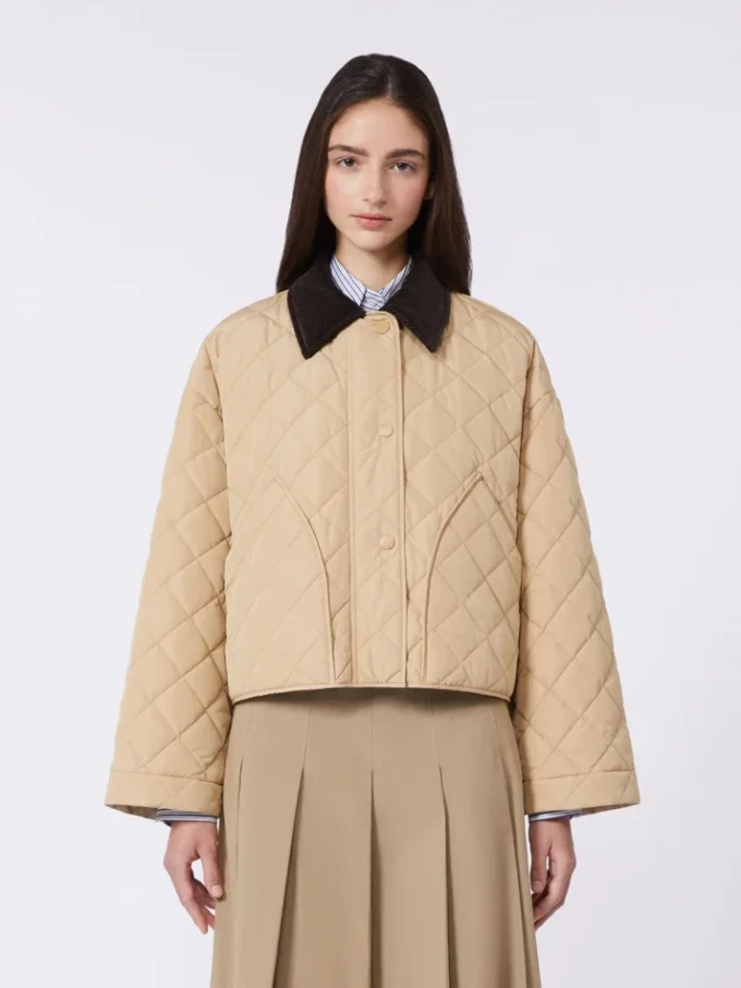 Vendbar, vattert jakke i vannavvisende stoff, beige