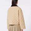 Vendbar, vattert jakke i vannavvisende stoff, beige