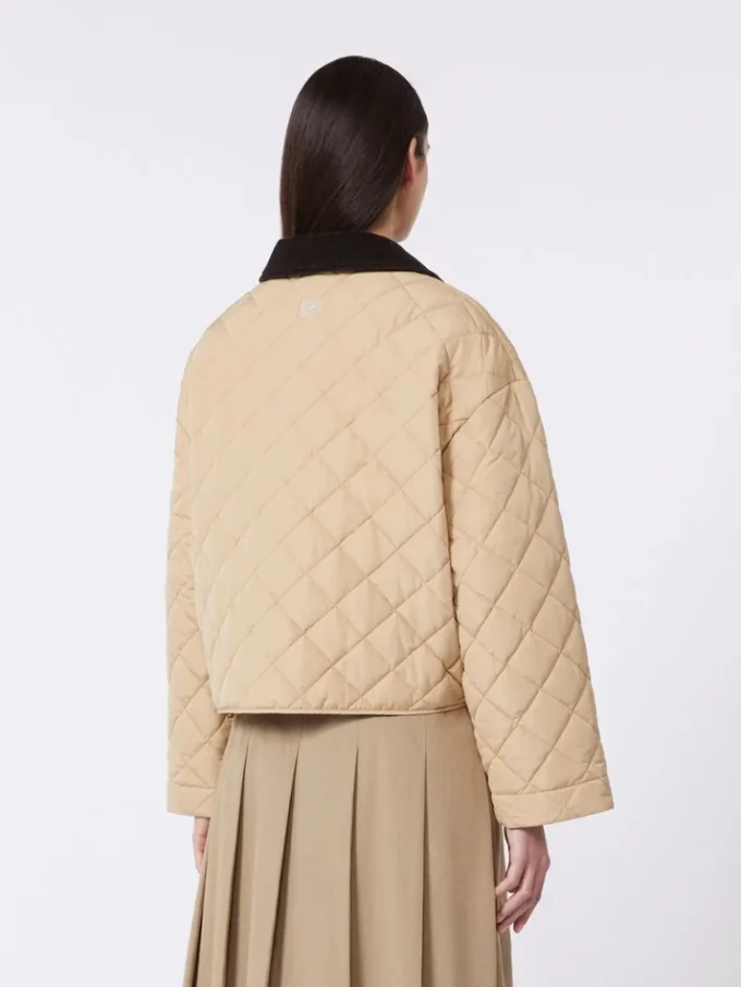Vendbar, vattert jakke i vannavvisende stoff, beige