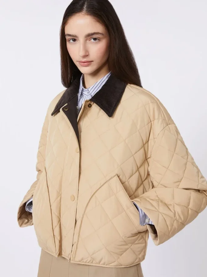Vendbar, vattert jakke i vannavvisende stoff, beige