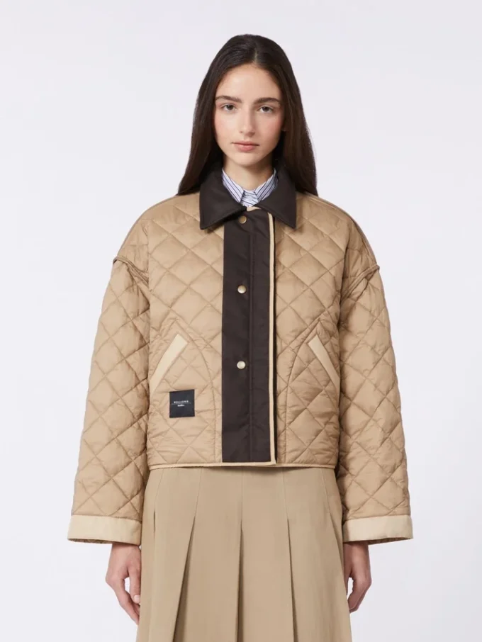 Vendbar, vattert jakke i vannavvisende stoff, beige